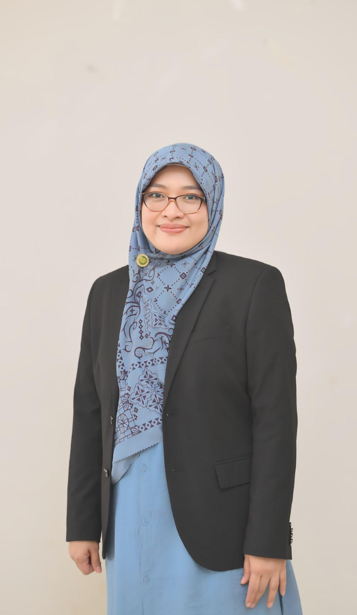 Ida Riaeni, S.Sos, M.I.Kom